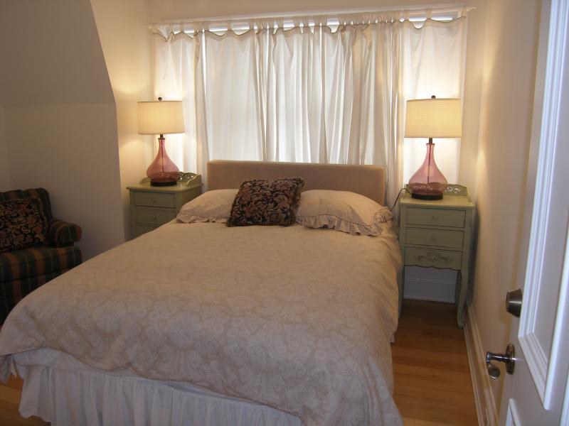 queen size bed with attached outdoor deck