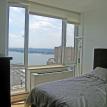 2nd bedroom with queen size bed overlooking the hudson river