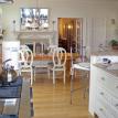 kitchen with fire place opens into the formal dining room